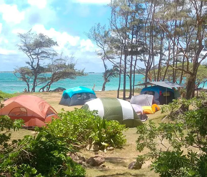 A series of tent camps set up at Malaekahana Beach Campground