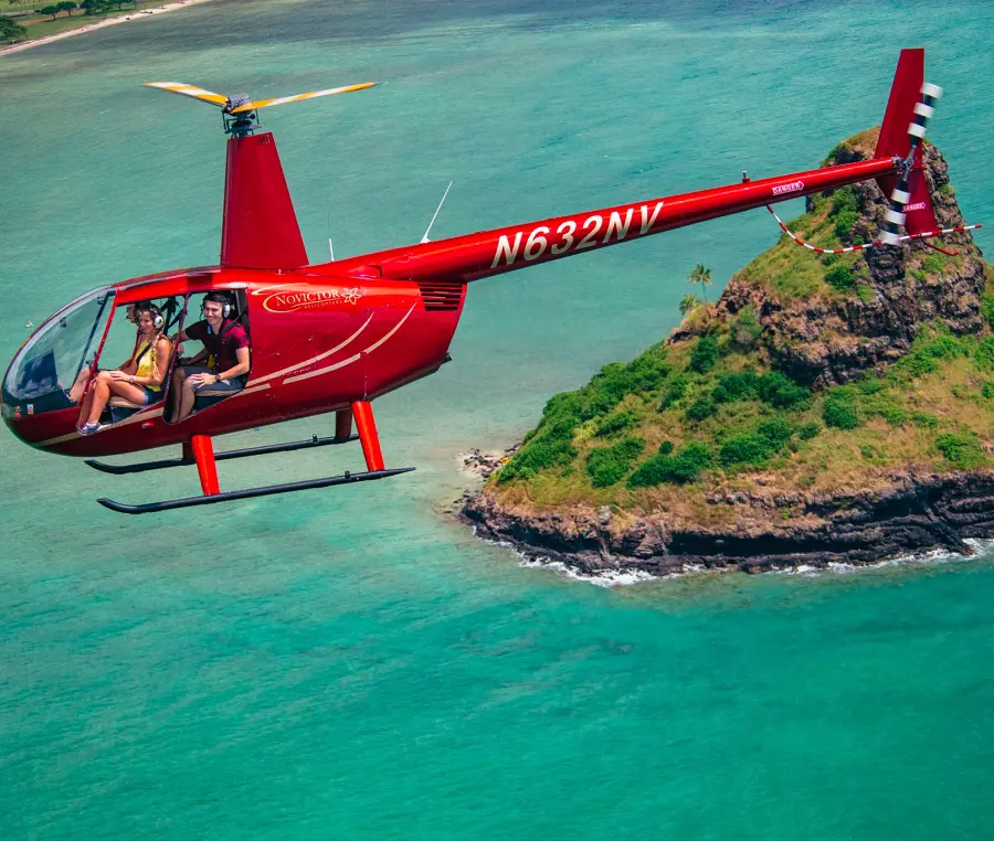 Passengers aboard N632NV of Rainbow Helicopters observe the landscape of Hawaii