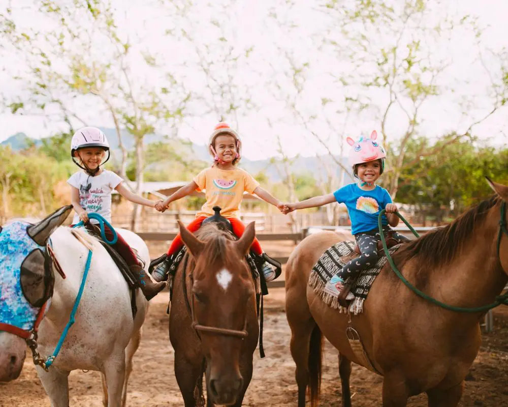 Kids enjoying horseback riding at North Shore Stables