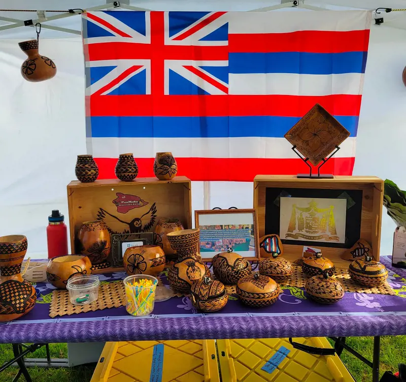 A stall with handmade crafts at Kuhio Hale Farmers Market