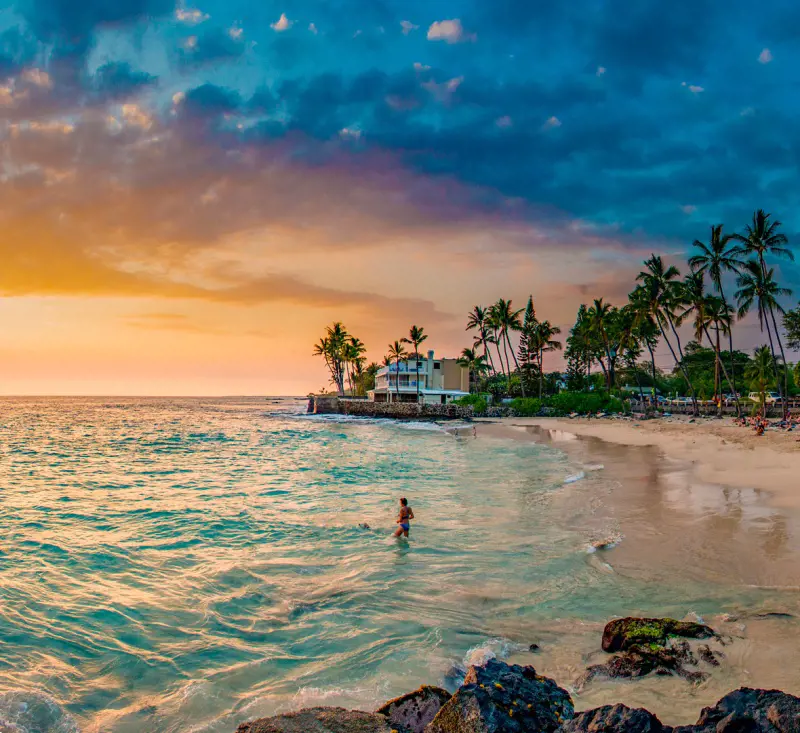 A lovely sunset view of the Magic Sand Beach in Kona