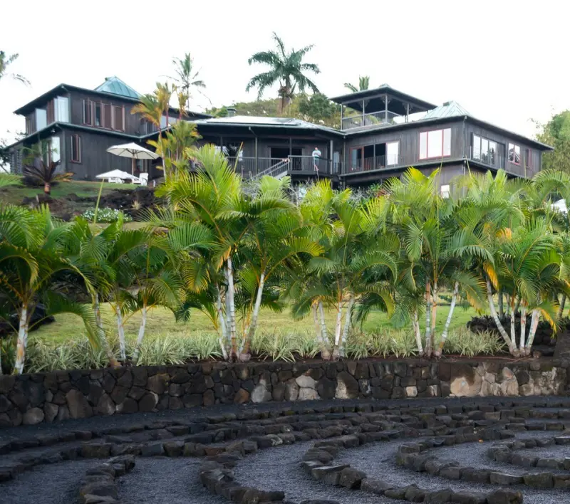 A panoramic view of the Holualoa Inn taken from the meditative path in the garden