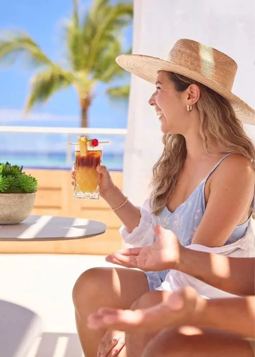 Enjoy the moring sun with some toast and complimentary chilled cocktails at Outrigger Reef 