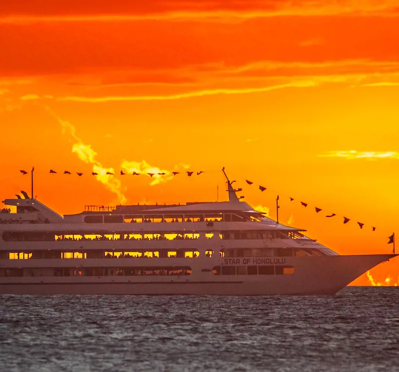 The Star of Honolulu cruise ship sailing in the Hawaiian waters during sunset