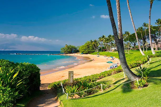 A panoramic view of the boardwalk along Ulua Beach located on the south shore of Maui