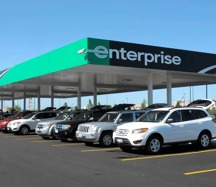 The fleet of vehicles lined up at the Enterprise Rent A Car