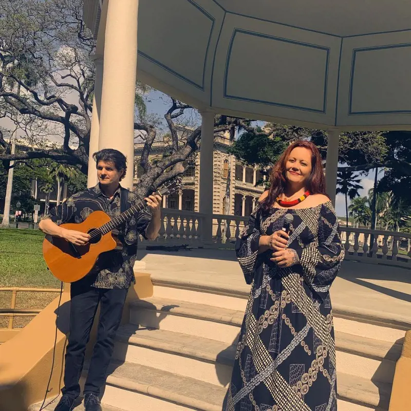 Amy Hanaialii [right] gives a musical performance in May 2021