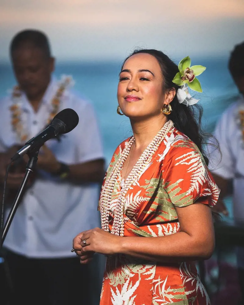 Raiatea in beautiful floral dress performing at Four Seasons Resort Oahu in 2021