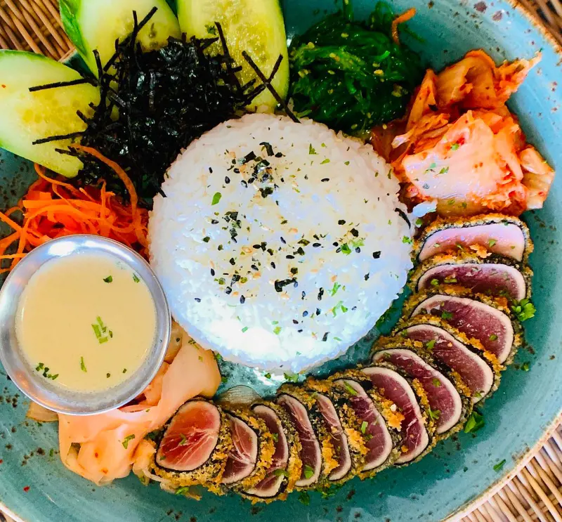 An yummy Ahi Katsu recipe made with crispy, breaded, fried pieces of fish topped with a sauce at Lahaina Fish Co